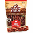 Load image into Gallery viewer, Braided bully sticks made from natural farm raw beef jerky, displayed on a wooden surface