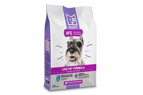 A bag of dog food labeled "vit f formula," specifically SquarePet VFS Digestive Support Low Fat Formula