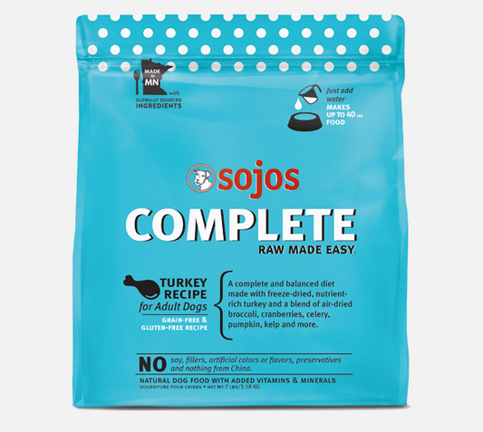 Sojos Complete Turkey Recipe dog food bag featuring a vibrant design and clear product labeling for adult dogs.